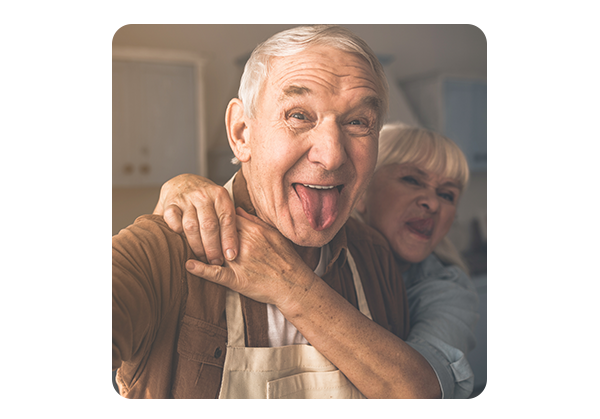 Old couple taking a selfie